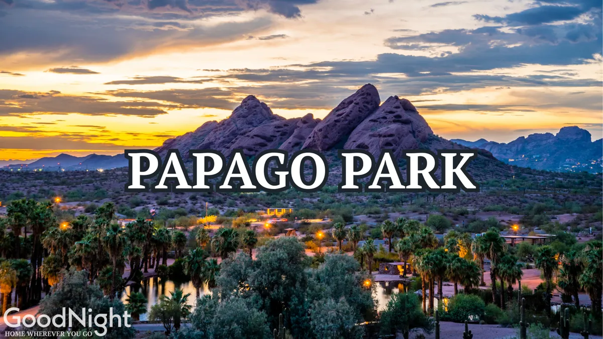 A stunning exterior scene showcasing majestic mountains, lush palm trees, and a vibrant sunset sky. The landscape exudes tranquility and showcases the inviting Arizona climate, perfect for outdoor enjoyment all year round.